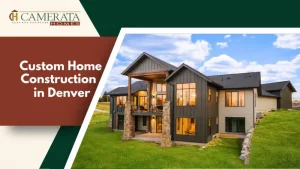 Luxury Denver custom home with dark siding, stone columns, and wide green lawn